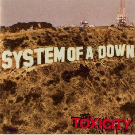 CD van System Of A Down met albumtitel Toxicity, presentatief in jewelcase met albumkunst op de voorkant