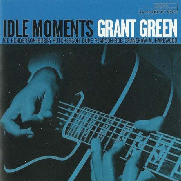 CD van Grant Green met de titel Idle Moments, albumhoes met groene achtergrond en jazzmuziek artwork.