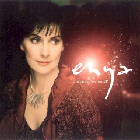 Enya Christmas Secrets CD-single, vier tracks, albumhoes met kerstthema en artistafbeelding, muziekopname in de afbeelding