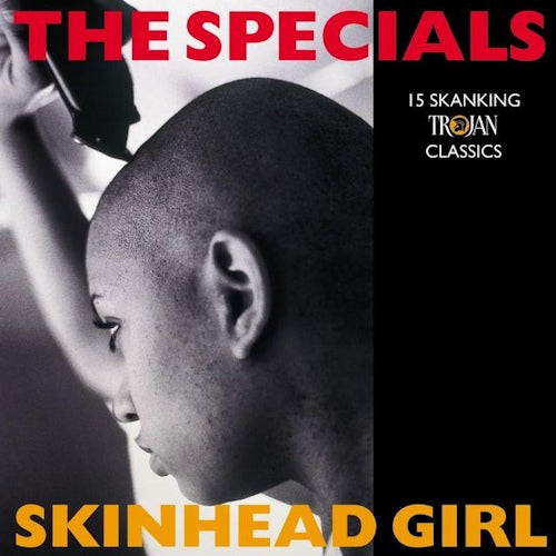 Vinyl LP van The Specials met album cover van een skinhead meisje, zwart-wit afbeelding met bandnaam en titel.