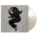 Coloured 12-inch maxi-single van Sevdaliza met de track 'The Calling' weergegeven met kleurrijk ontwerp op de cover.
