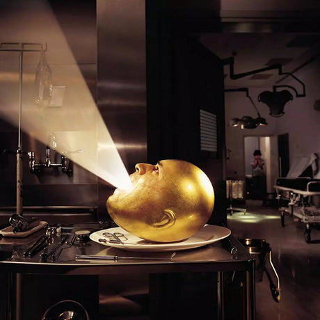 CD van The Mars Volta: De-loused in the Comatorium met kleurrijk albumhoes en artwork van de band.