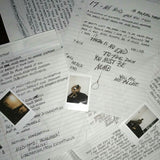 LP van XXXTENTACION met het album 17, zwart vinyl met albumkunst op de voorkant, gelegen op een houten achtergrond.