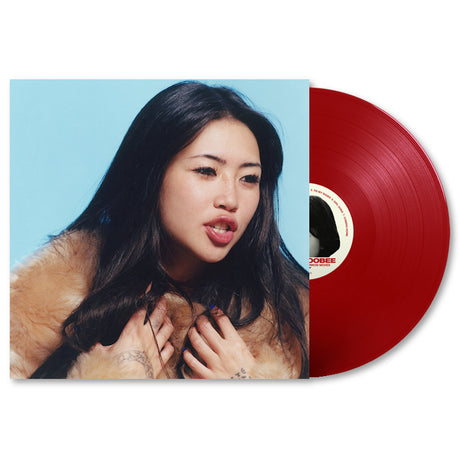Kleurrijke LP van beabadoobee getiteld "This is how tomorrow moves" met albumhoes en kleurrijk ontwerp.